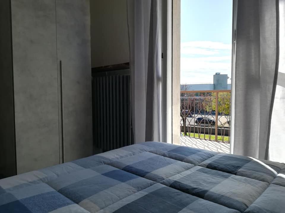 Postel nebo postele na pokoji v ubytování LE MURA Foresteria