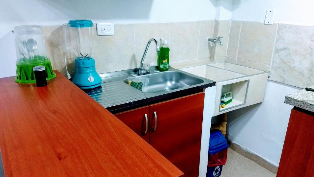 Kuchyň nebo kuchyňský kout v ubytování Confort apartaestudio completo Aire acondicionado Todo independiente