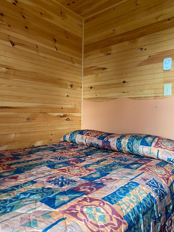 Postel nebo postele na pokoji v ubytování Cavendish Lodge & Cottages