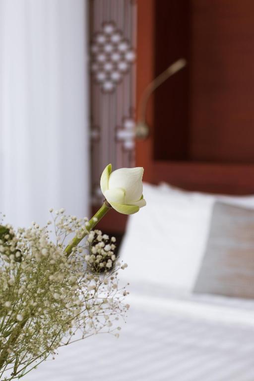 Postel nebo postele na pokoji v ubytování Amanjaya Pancam Suites Hotel
