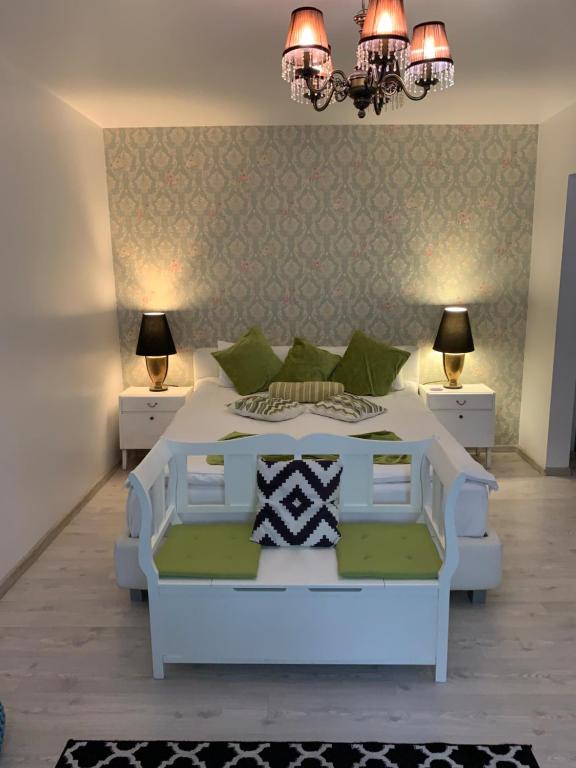 Ένα ή περισσότερα κρεβάτια σε δωμάτιο στο cozy apartment in a quiet area