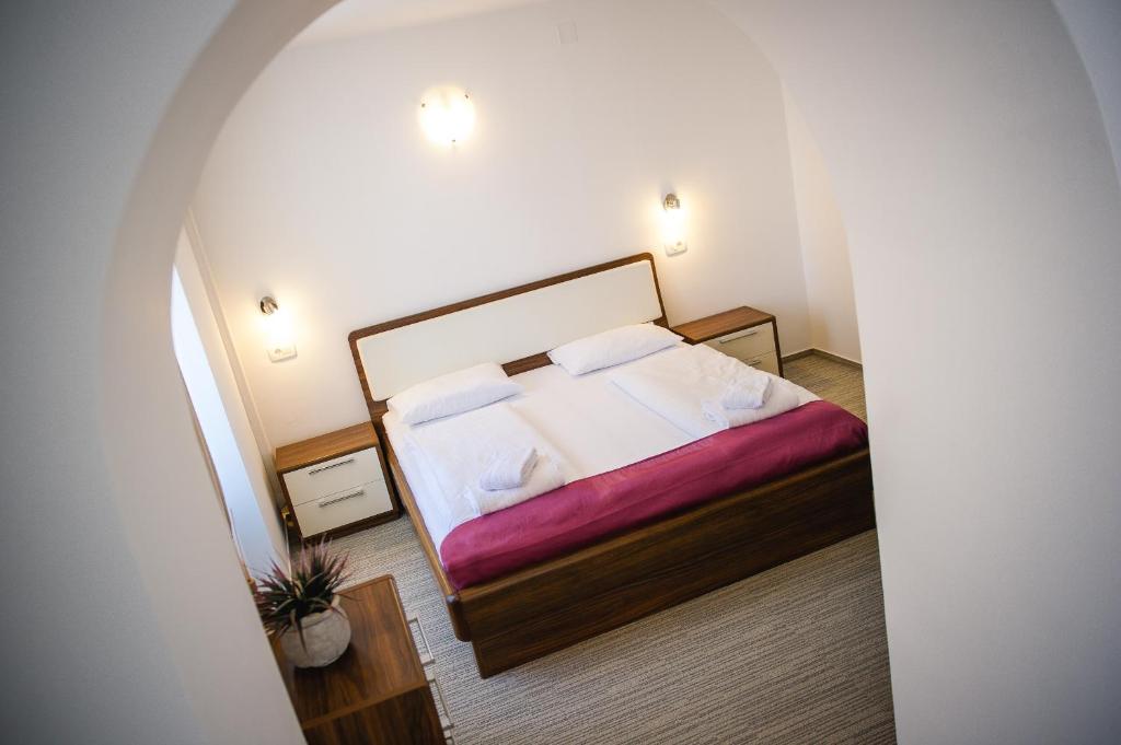 Postel nebo postele na pokoji v ubytování Villa Andor