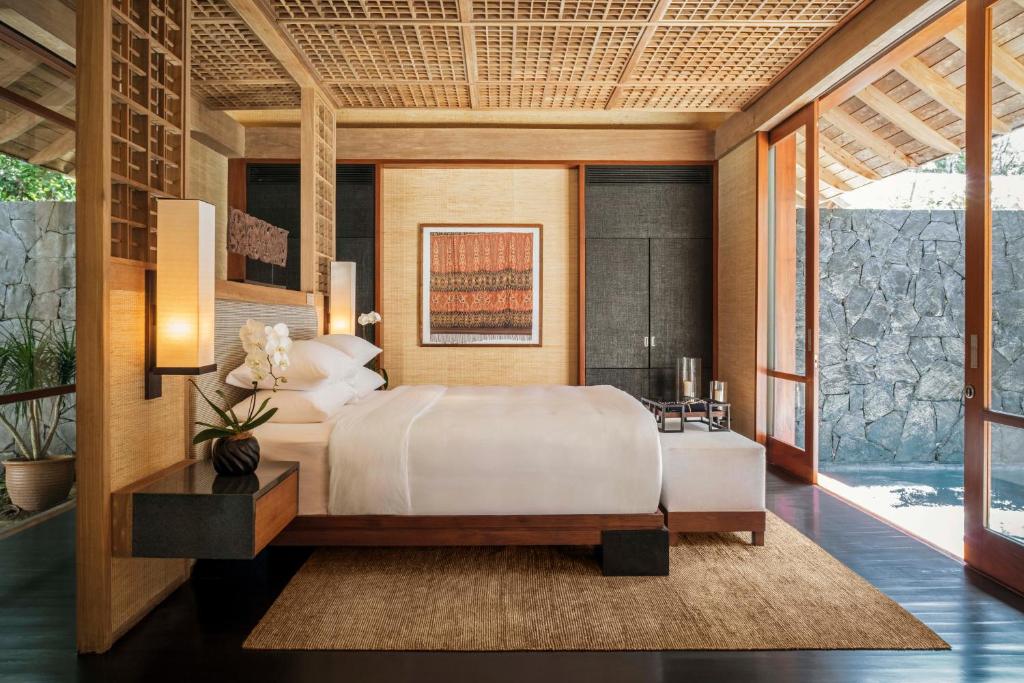 Ein Bett oder Betten in einem Zimmer der Unterkunft The Datai Langkawi