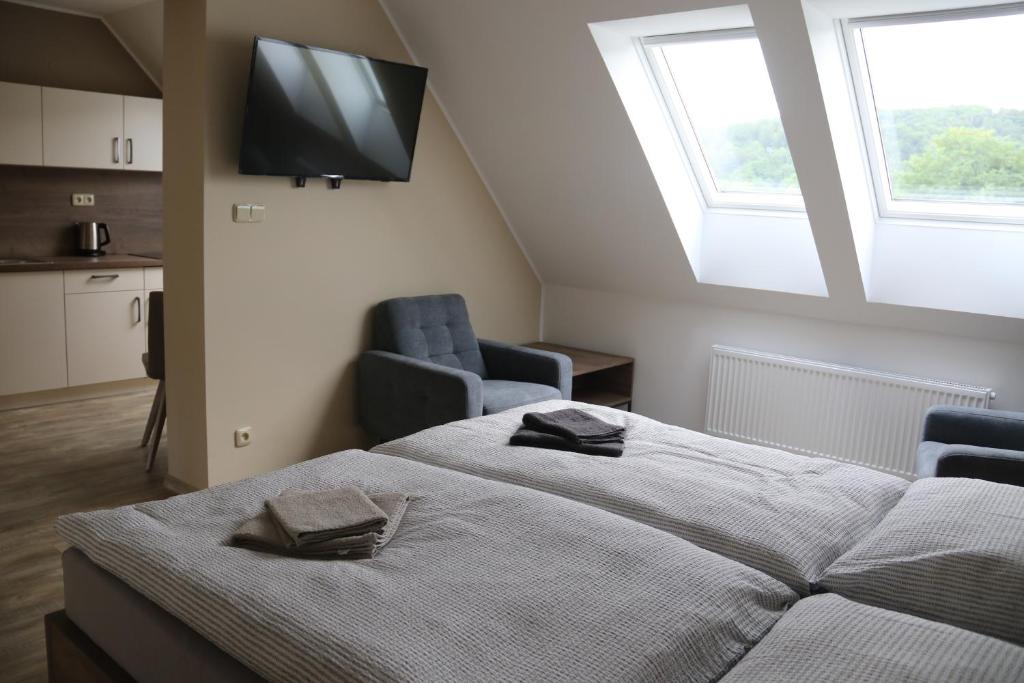 Postel nebo postele na pokoji v ubytování Apartmány LAMA