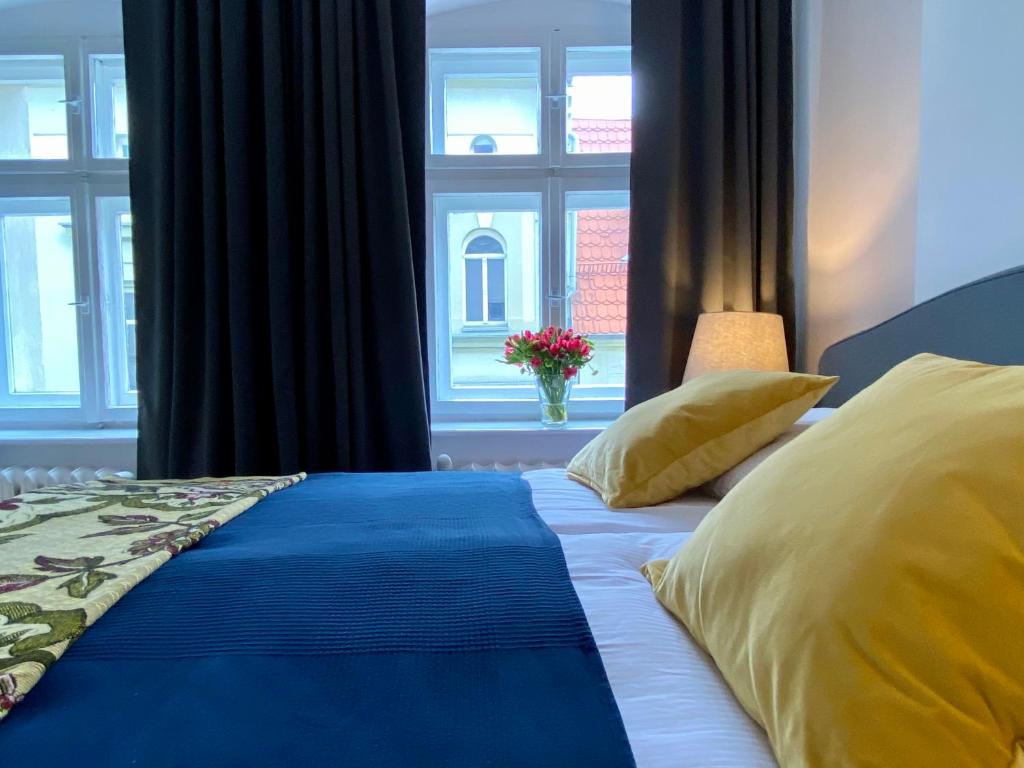 Posteľ alebo postele v izbe v ubytovaní apartament Hrabala
