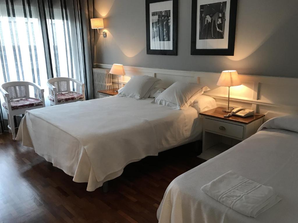 Posteľ alebo postele v izbe v ubytovaní Hotel Vostra Llar