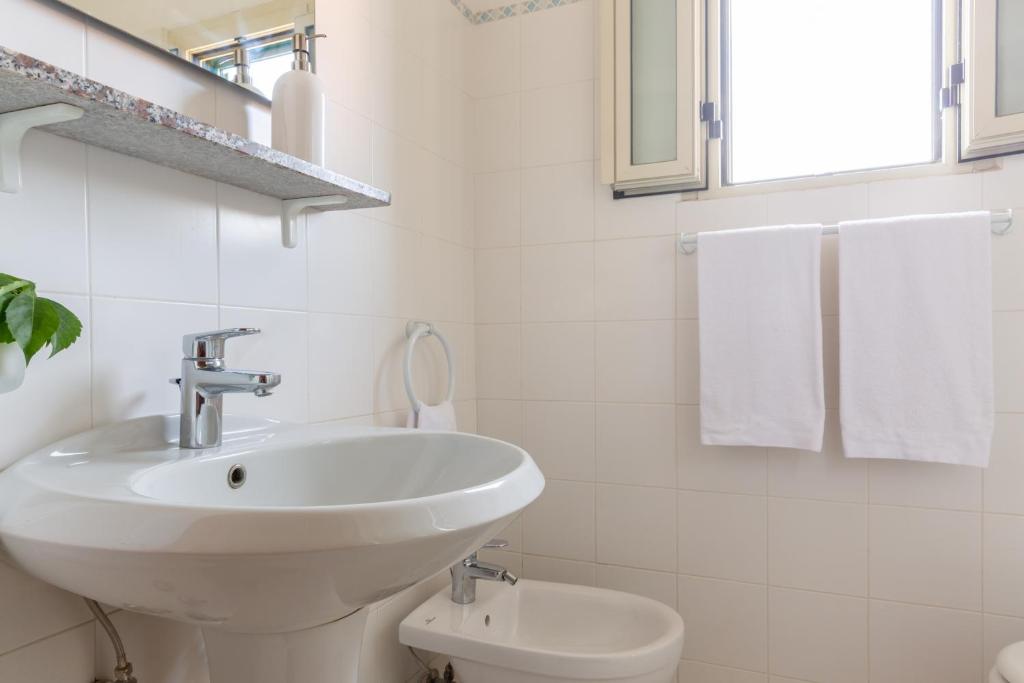 Kúpeľňa v ubytovaní Happy Sea Home Monolocale Angolo Cottura 4 pax