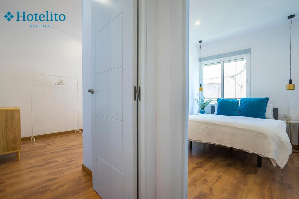 Posteľ alebo postele v izbe v ubytovaní Hotelito Boutique Badalona Mar