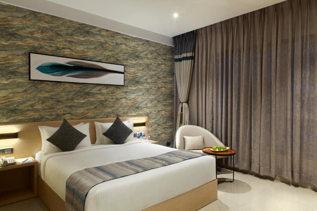 Postel nebo postele na pokoji v ubytování Click Hotel Bangalore - International Airport