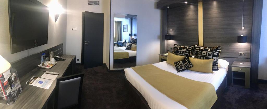 TV a/nebo společenská místnost v ubytování Hotel Palladia