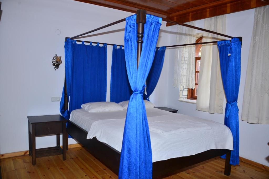 Postel nebo postele na pokoji v ubytování Aquarius Hotel