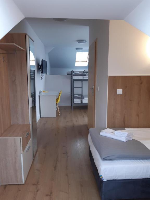 Posteľ alebo postele v izbe v ubytovaní SZWEDZKA22 PL Premium Rooms