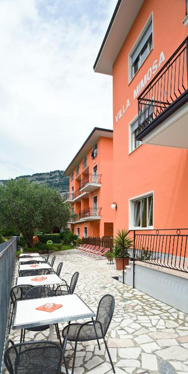 Fotografie z fotogalerie ubytování Albergo Villa Mimosa v destinaci Nago-Torbole