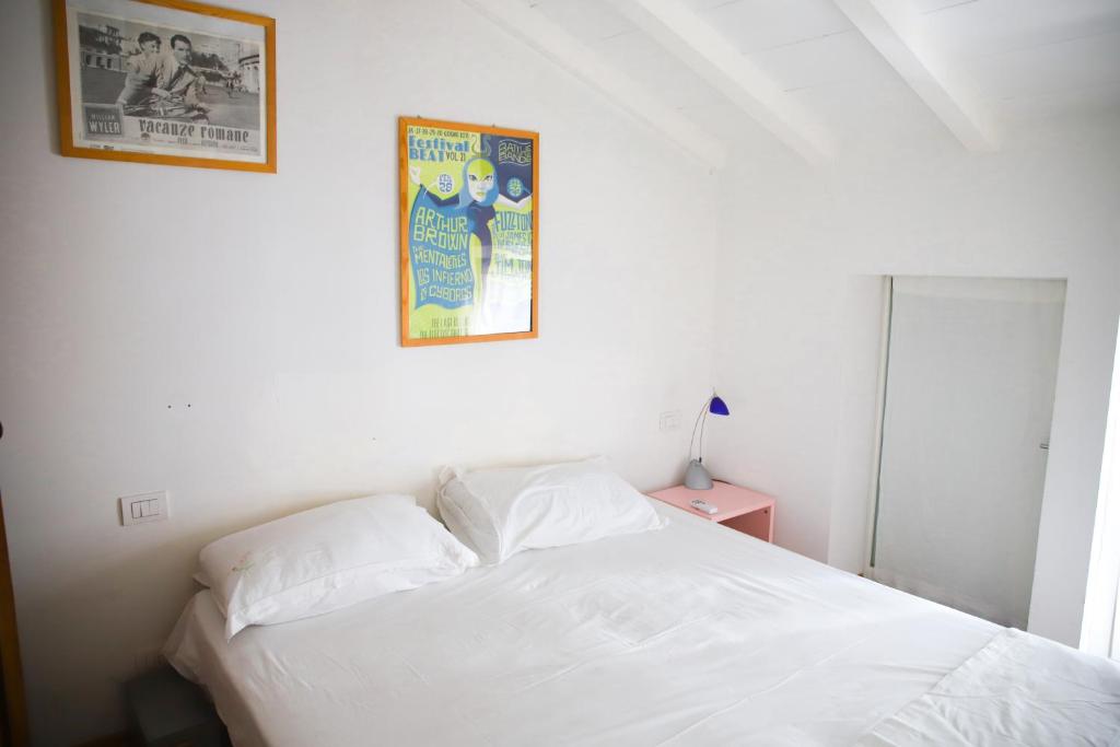 A bed or beds in a room at La Casina