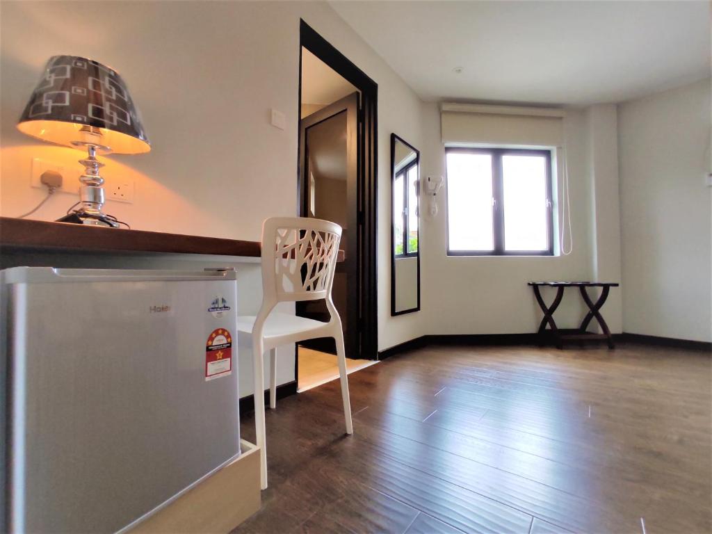 Kuchyň nebo kuchyňský kout v ubytování Apple Suites Hotel