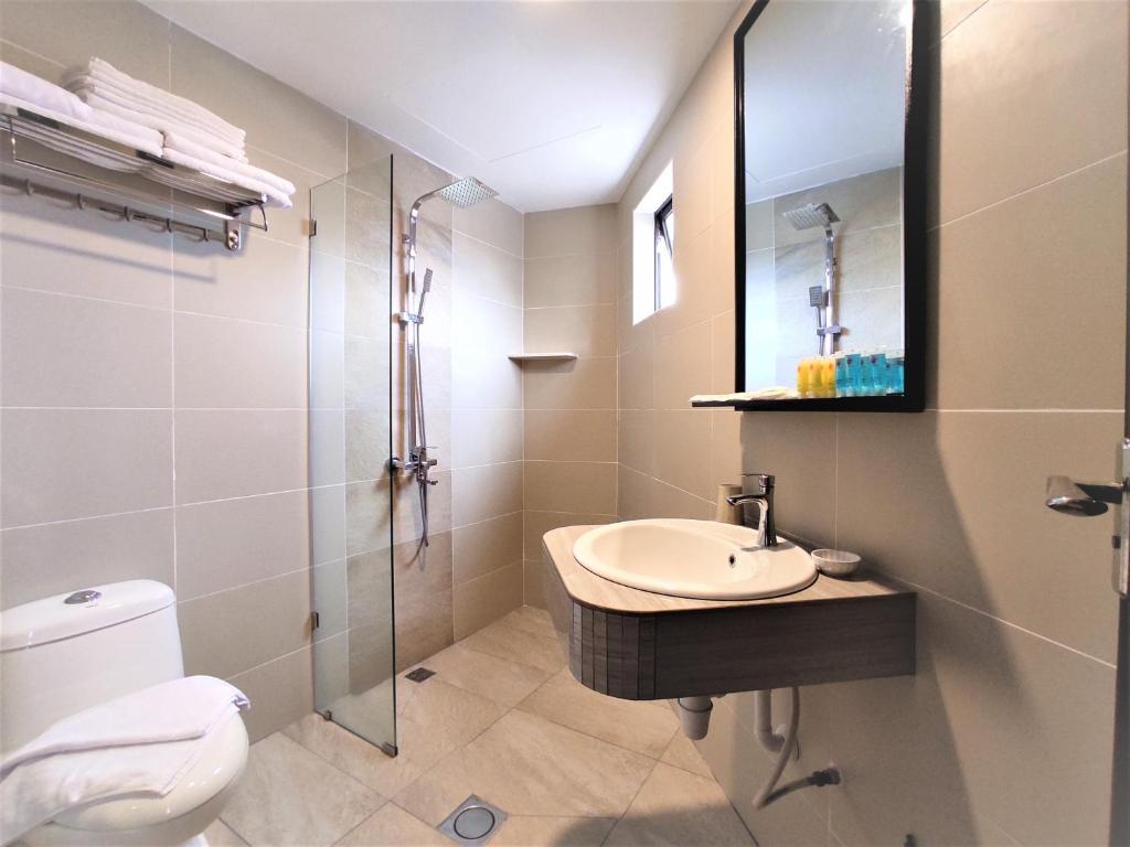 Koupelna v ubytování Apple Suites Hotel