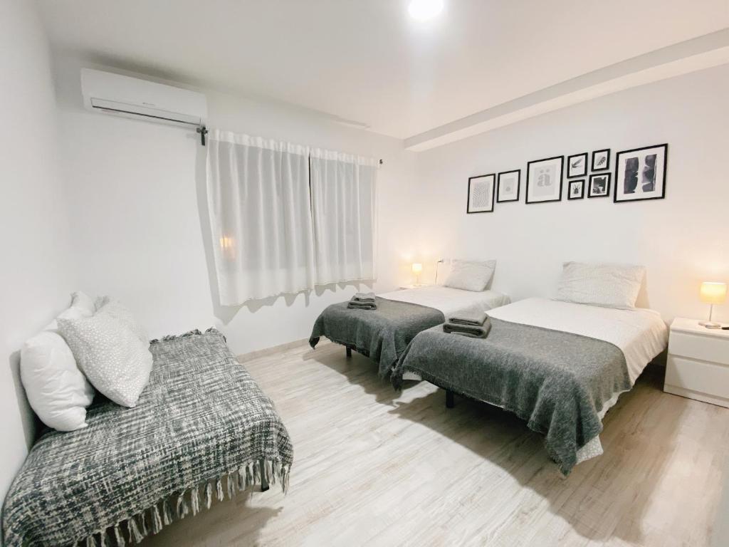 Posteľ alebo postele v izbe v ubytovaní GMC Turistics - Great Apartment for Groups & Families