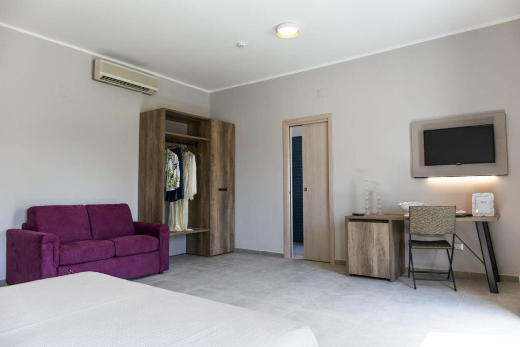 TV a/nebo společenská místnost v ubytování Hotel San Vincenzo Resort
