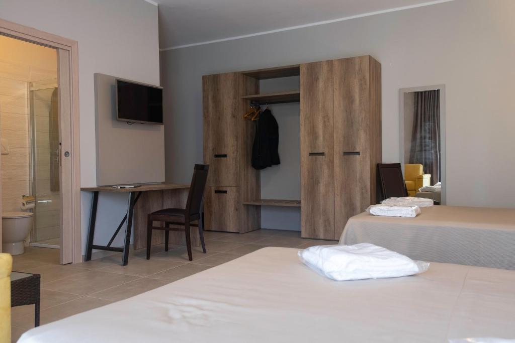 Postel nebo postele na pokoji v ubytování Hotel San Vincenzo Resort