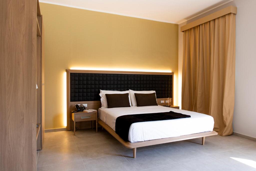 Postel nebo postele na pokoji v ubytování Hotel San Vincenzo Resort
