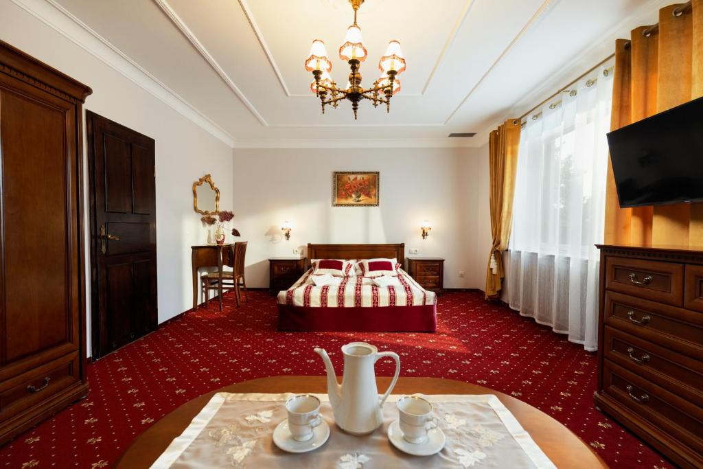 Posteľ alebo postele v izbe v ubytovaní Villa Toscania-check in 24h