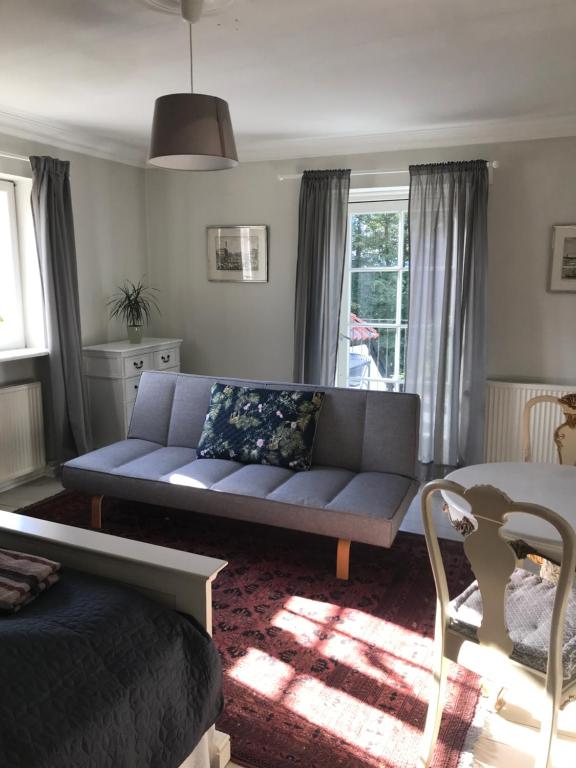 Posezení v ubytování Øbjerggaard Bedrooms