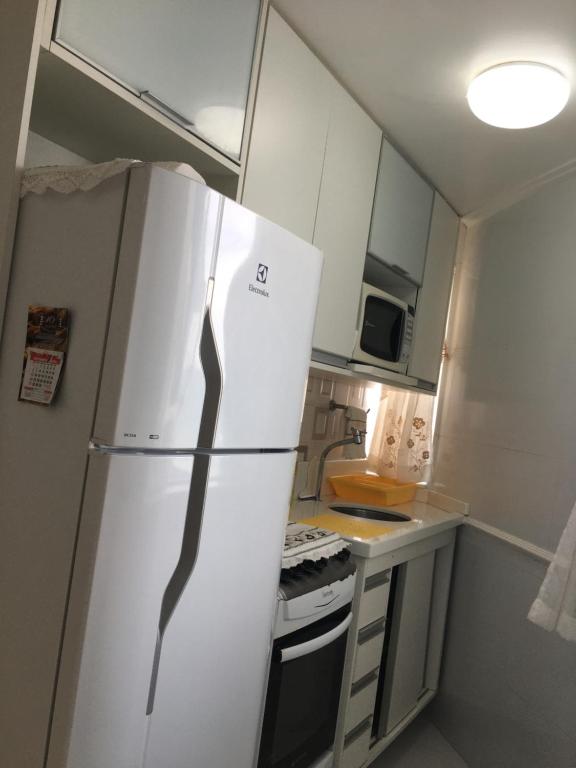 Kuchyň nebo kuchyňský kout v ubytování Ap 210 Bahia Flat, Barra