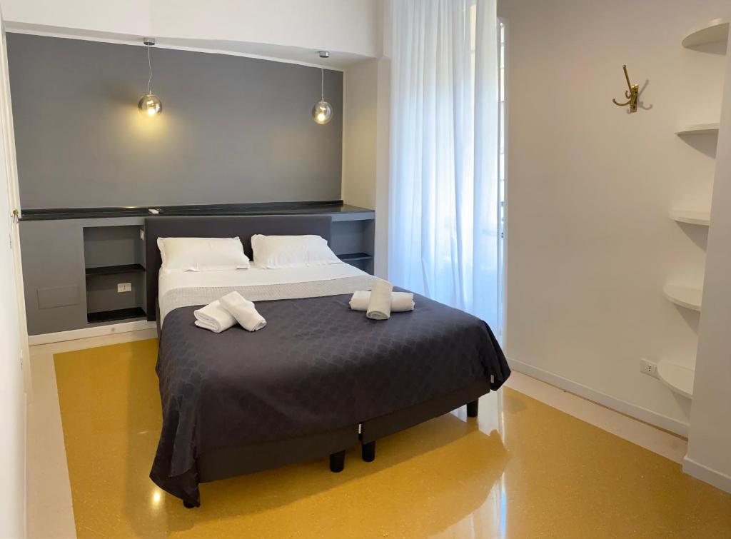 Posteľ alebo postele v izbe v ubytovaní Art Atelier Risorgimento Guest House