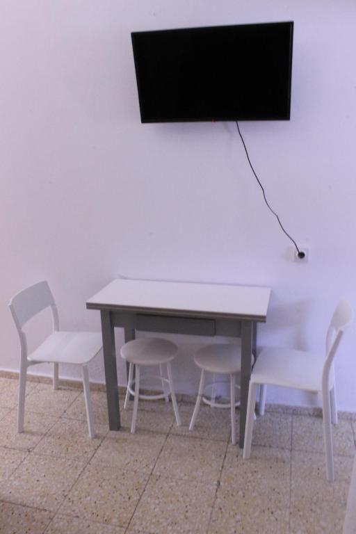 TV a/nebo společenská místnost v ubytování Mele Sky Beach Playa de Mogán