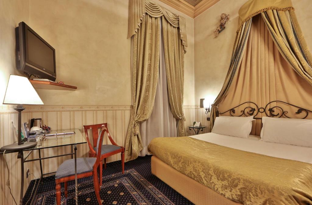 Postel nebo postele na pokoji v ubytování Best Western Plus Hotel Genova