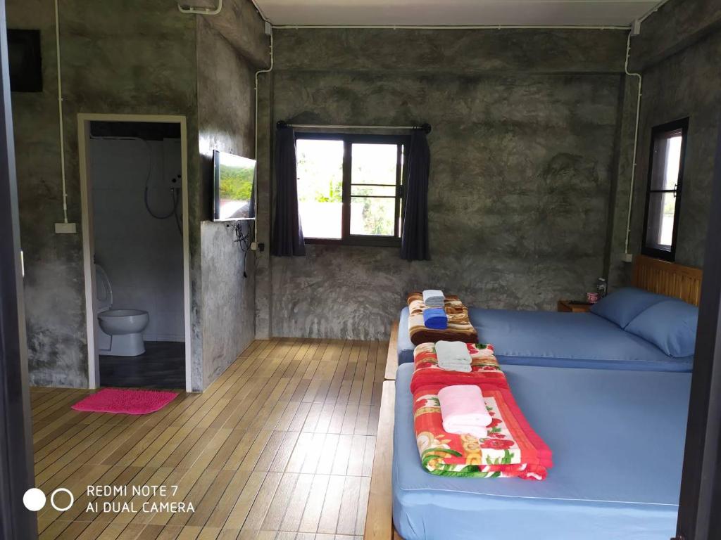 Posezení v ubytování PilokMyhome ที่พักเหมืองปิล็อก บ้านอีต่อง
