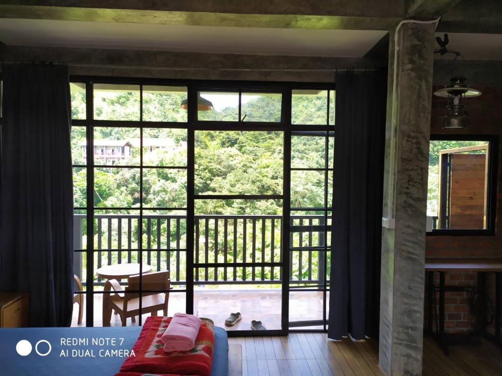 Balkón nebo terasa v ubytování PilokMyhome ที่พักเหมืองปิล็อก บ้านอีต่อง