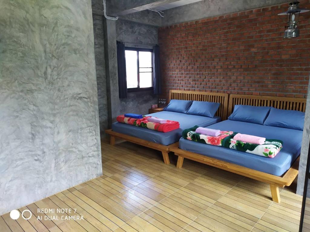 Posezení v ubytování PilokMyhome ที่พักเหมืองปิล็อก บ้านอีต่อง