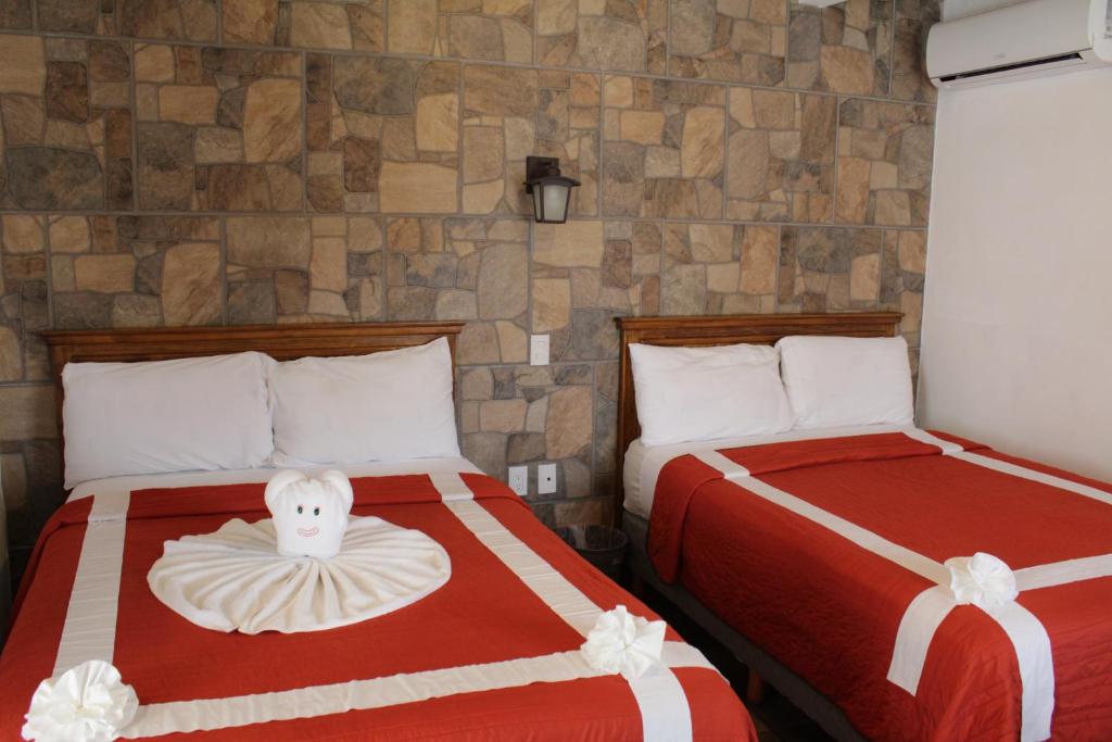 Cama o camas de una habitación en Venados Inn