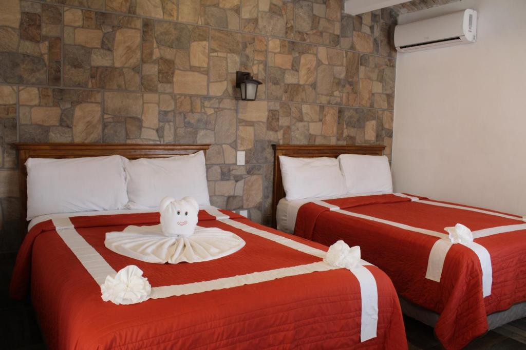 Cama o camas de una habitación en Venados Inn