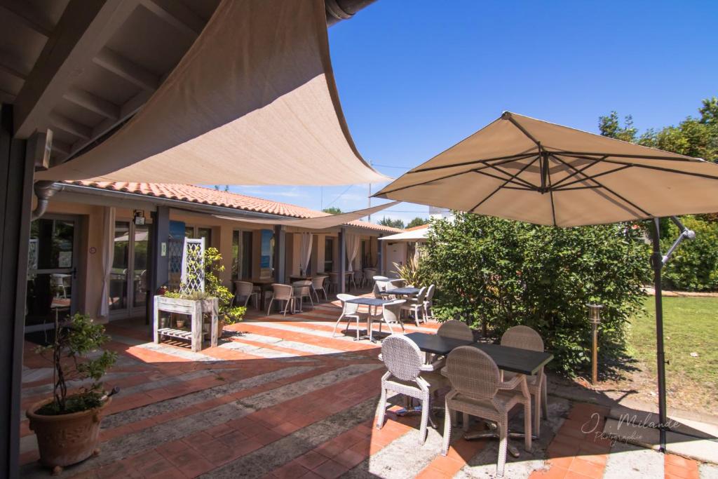 Zahrada ubytování LOGIS HOTELS - Hôtel et Restaurant L'Océana