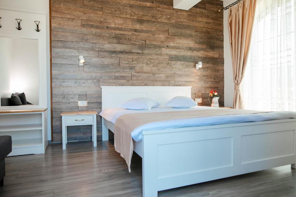 Postel nebo postele na pokoji v ubytování Casa Iarina