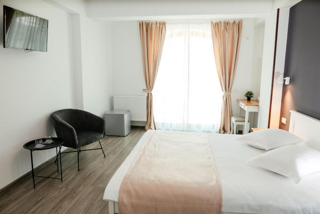 Postel nebo postele na pokoji v ubytování Casa Iarina