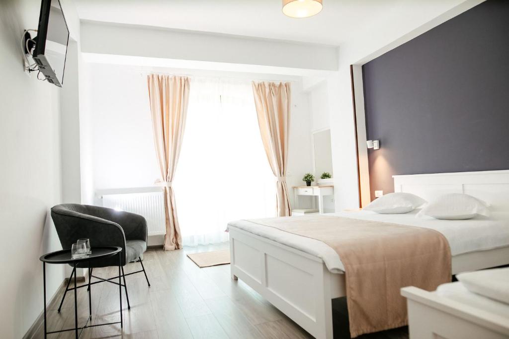 Postel nebo postele na pokoji v ubytování Casa Iarina