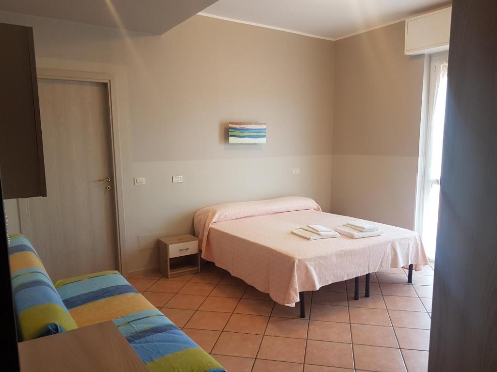 Ein Bett oder Betten in einem Zimmer der Unterkunft Appartments Gallarana