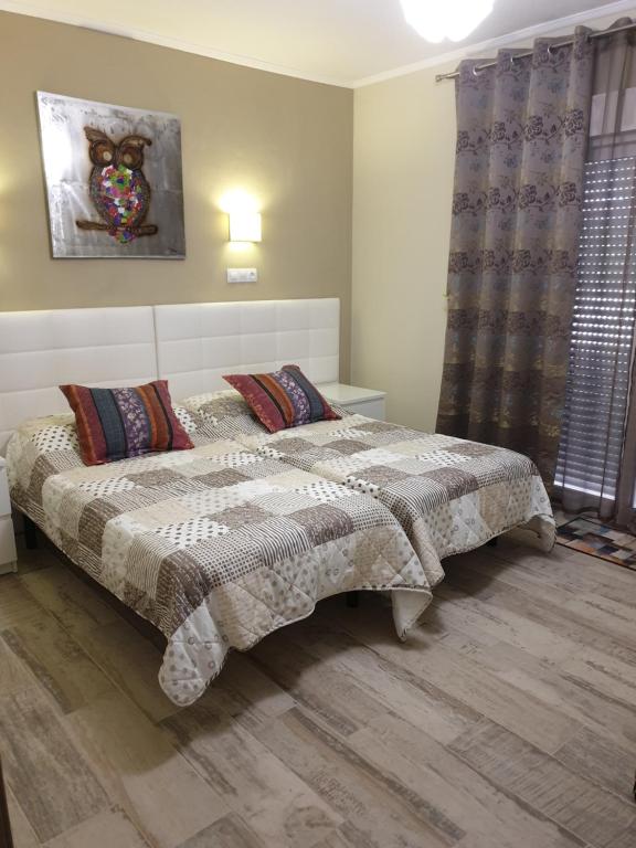 A bed or beds in a room at Villa Irena Denia