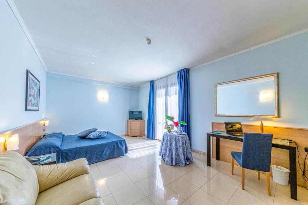 Posteľ alebo postele v izbe v ubytovaní Hotel Le Torri