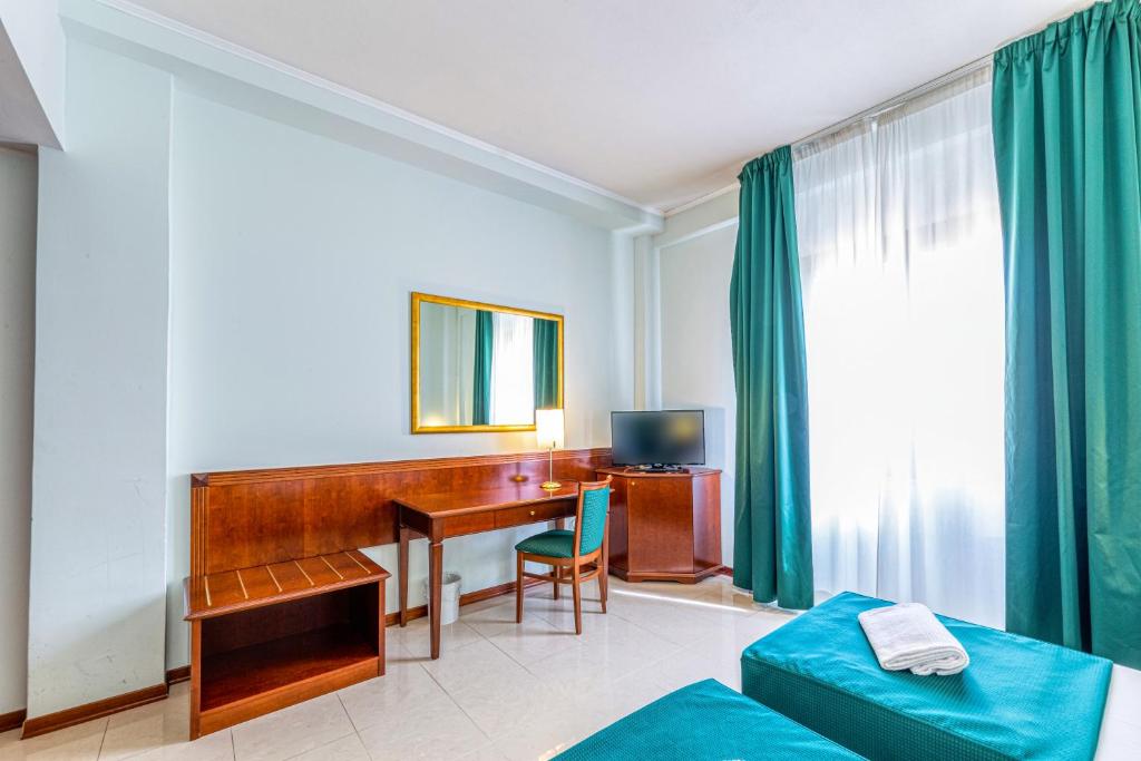 Posteľ alebo postele v izbe v ubytovaní Hotel Le Torri
