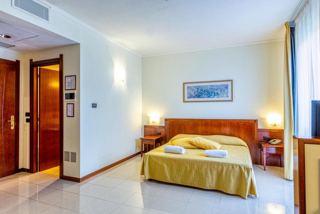 Posteľ alebo postele v izbe v ubytovaní Hotel Le Torri