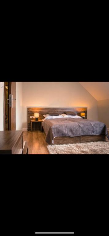 Posteľ alebo postele v izbe v ubytovaní PIANO CAFE b&b