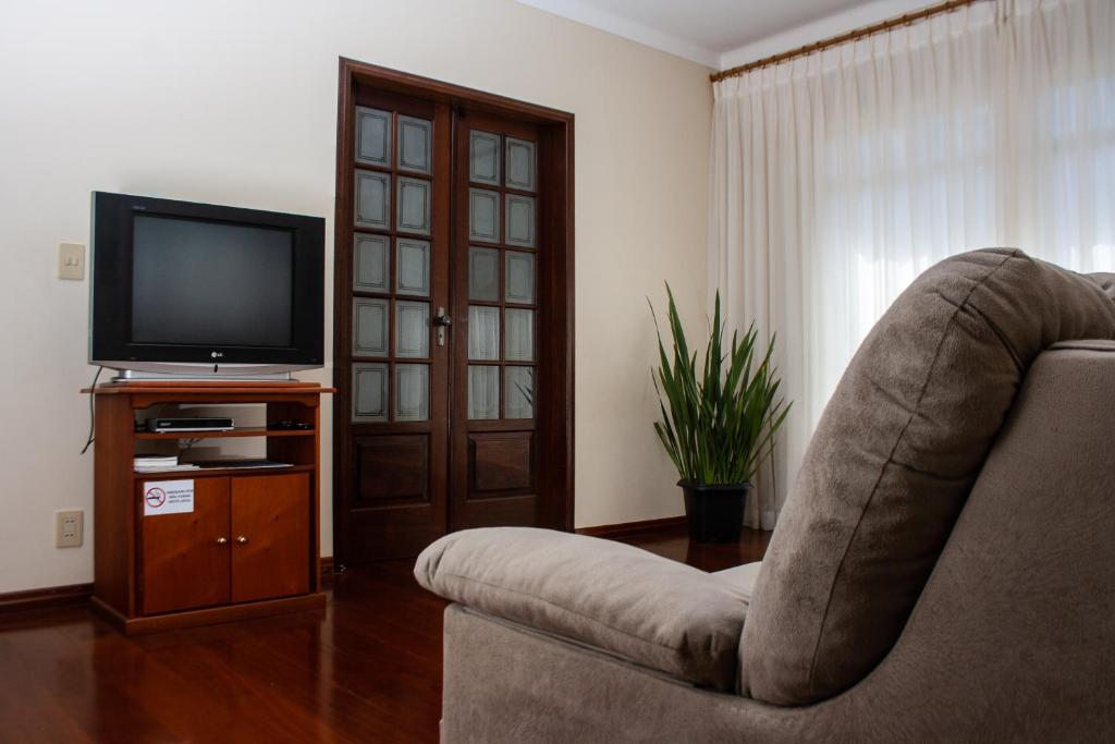 TV a/nebo společenská místnost v ubytování Apart Hotel Água Limpa