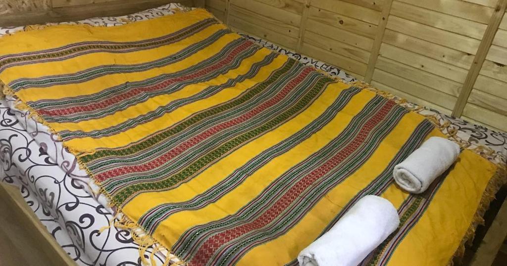 Postel nebo postele na pokoji v ubytování Садиба 2 Підкова чан та сауна