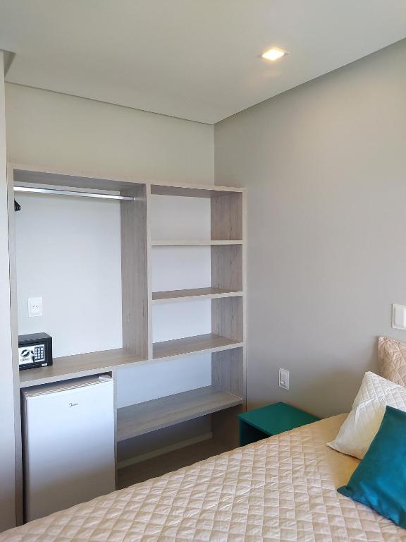 Uma cama ou camas num quarto em Pousada Vila Dos Mares