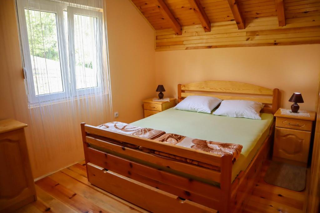 Postel nebo postele na pokoji v ubytování Adamov Konak Apartmani