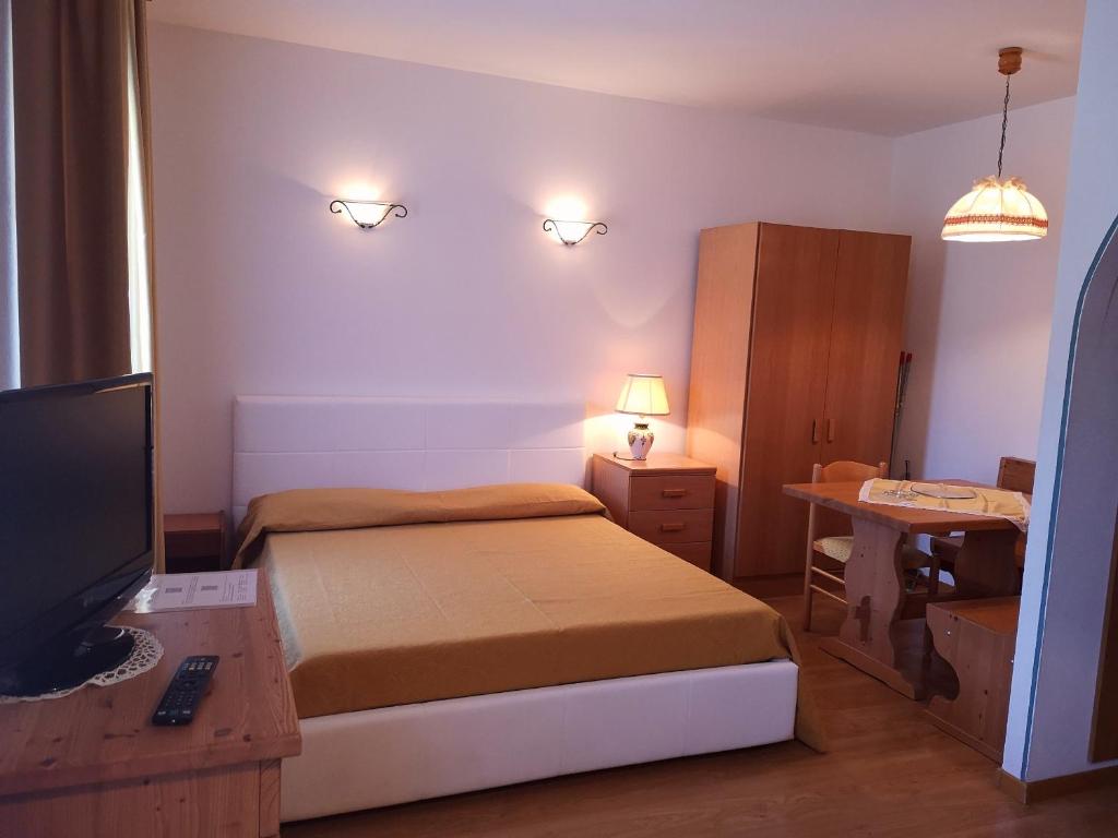 Posteľ alebo postele v izbe v ubytovaní Residence Capriolo